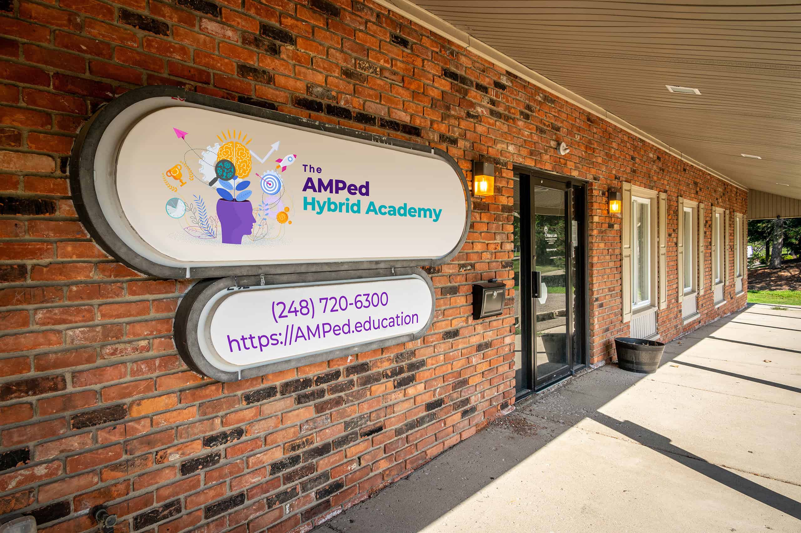 Logo on the entryway to AMPed Hybrid Academy